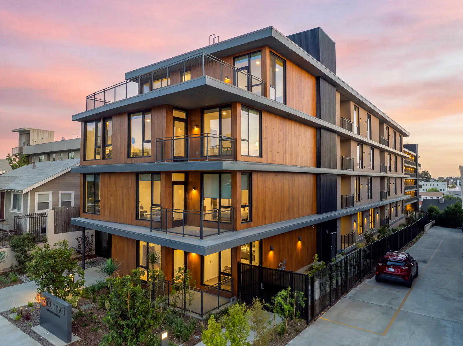 Exterior - Rear Facade & Courtyard at Twilight